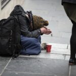 Photo of person begging