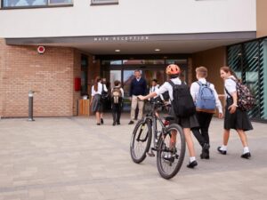 children walking into a school