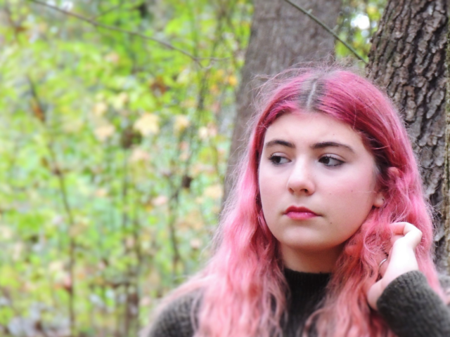 Photo of teenage girl with pink hair