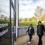 Two students entering the ISER building