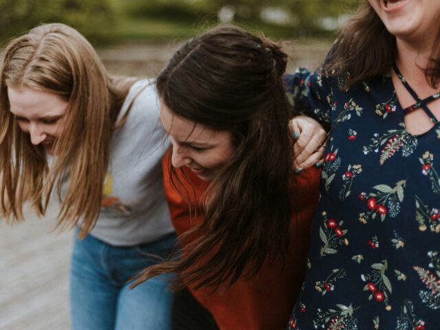 A group of teenage friends, laughing